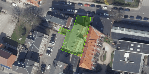 Satellite image with the property's plot outlined in green